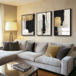 Large-frame black and gold abstract wall art three-piece set for the living room