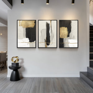 Large-frame black and gold abstract wall art three-piece set for the living room